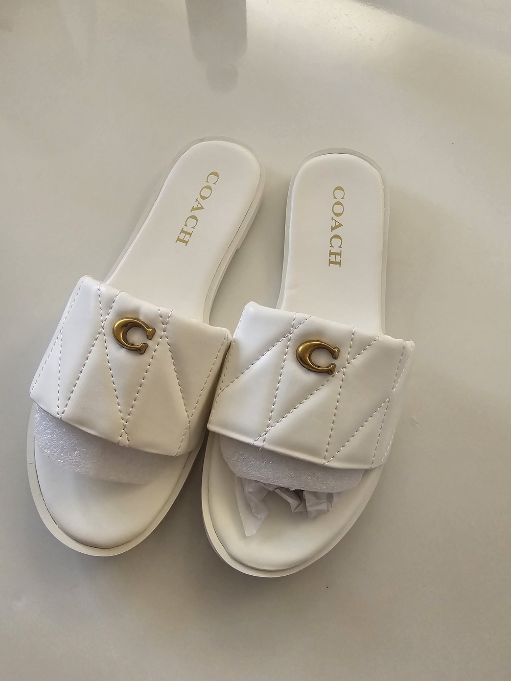 Coach Women's White Quilted Slide Sandals with Gold Accent - Picture 2 of 5